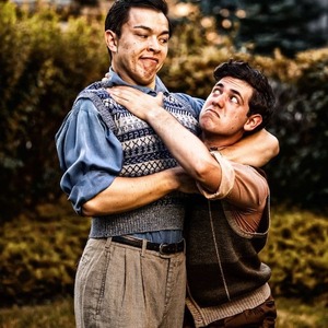 Two actors performing a fight scene in a Midsummer Night's Dream